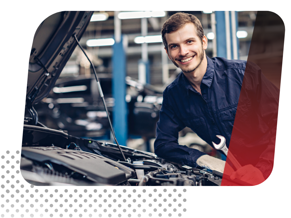 Car technician looking happy/