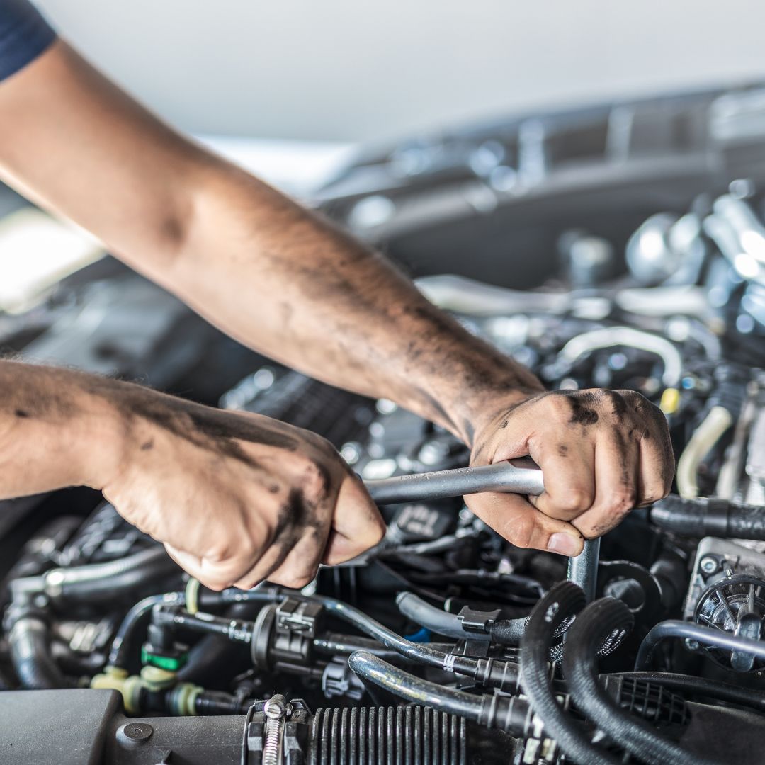 mechanic working on car