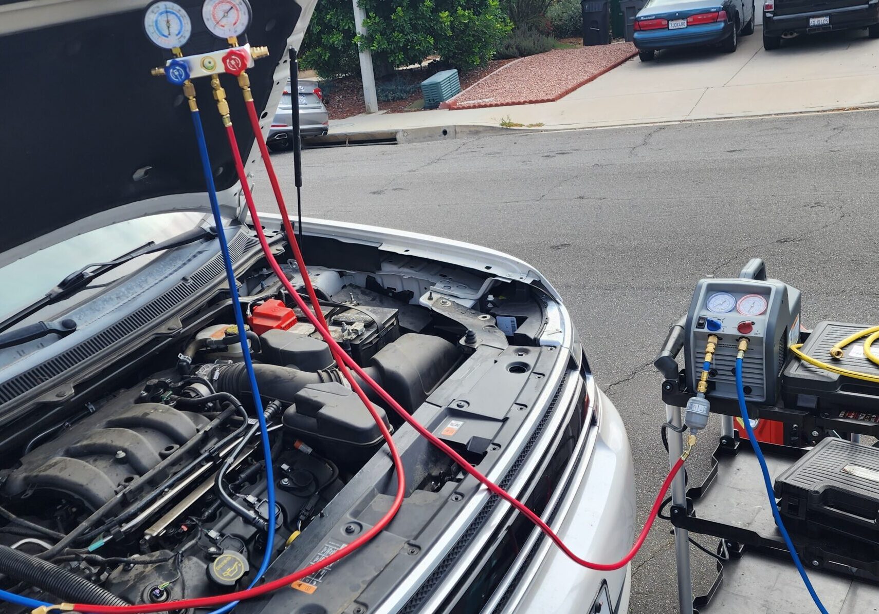 Mobile AC repair technician at work